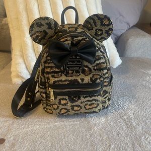 Lounge fly cheetah print sequin backpack.